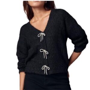 Design history black sweater with silver bows worn one time